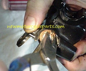 Removing Snap Ring with Snap Ring Plyers
